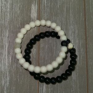 2 Lokai bracelets